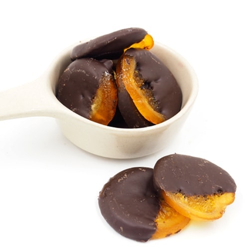 Nos tranches d'orange confites sont finement tranchées puis …